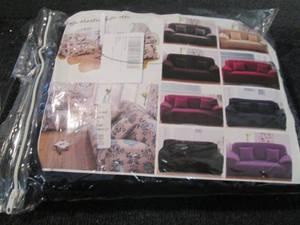 lot 211 image: Navy Loveseat Cover...