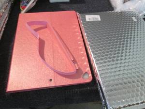 lot 226 image: 3 Shiny Pink iPad Pro 12.9 Cases...