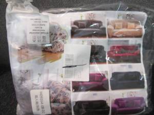 lot 241 image: Grey Loveseat Cover...