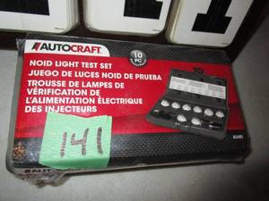 lot 141 image: Auto Craft 10 pc NOID Light Test Kit