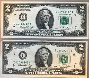 lot 32 image: Two Different 1976 $2 Federal Reserve Notes