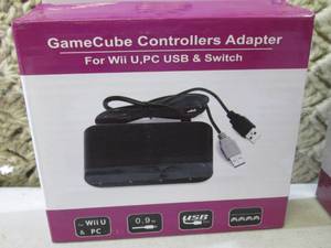 Lot of 4 Game Cube Controllers Adap...