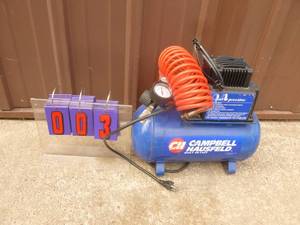 Campbell Hausfield 2 gallon air compressor. Used condition. Tested & works. As shown.