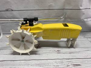 lot 88 image: Vintage Cast Iron Tractor Sprinkler