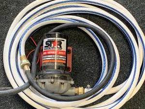 lot 115 image: 12 Volt Pump & Hose