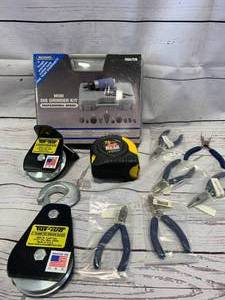 lot 185 image: Mini Die Grinder, 2 Sheaves, 25 ft Tape Measure, 6 Pliers