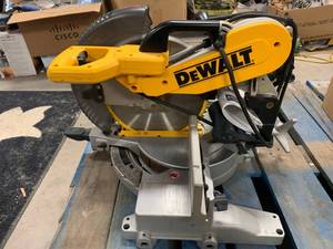 lot 61 image: DeWalt DW716 Compound 12 Double Bevel Miter Saw (used $489  Amazon)