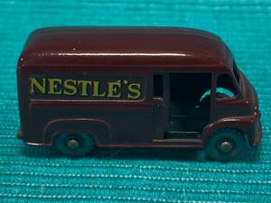 lot 57 image: Lesney Matchbox Commer 30 Nestle Van Gray Wheels #69