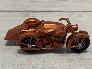 lot 110 image: Lesney Matchbox Harley Davidson Bronze with Sidecar #66