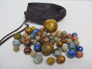 lot 108 image: Nice Group of AntiqueVintage Clay Marbles wLeather Pouch