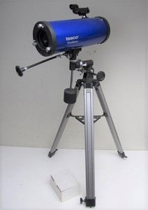 lot 33 image: Tasco Galaxsee Reflector Telescope with Tripod