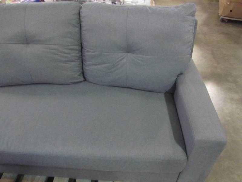 lot 22 image: Living Room Sofa - 85 x 33 x 27 with Foot Rest - Sofa is missing Feet.