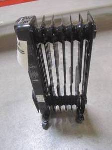 lot 866 image: OmniHeat 1500-Watt Oil-filled Radiant Flat Panel Electric Space Heater CYWE08-7
