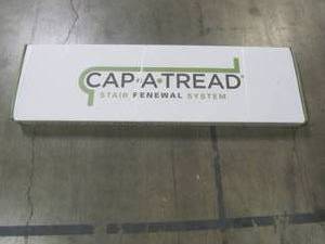 lot 918 image: Cap A Tread Restored Wood 47 in. Length x 12-18 in. W x 1-1116 in. T Vinyl Overlay for Stairs 1 in. T 016073684