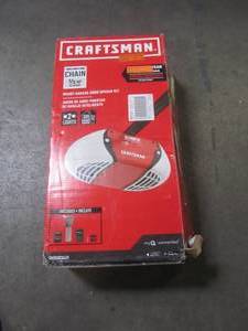 lot 879 image: CRAFTSMAN 0.5-hp Craftsman Chain Drive Garage Door Opener Works with MyQ with Built-In WiFi CMXEOCG471