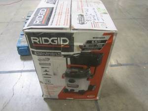 lot 897 image: RIDGID 16 gal. 6.5-Peak HP Stainless Steel Wet Dry Vac WD1956