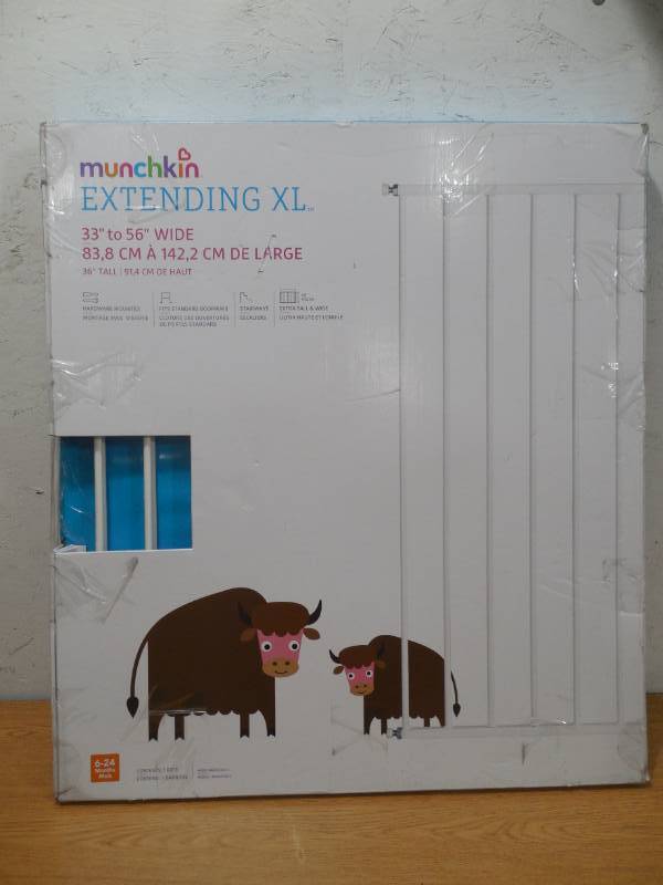 lot 36 image: Munchkin Extending XL Tall and Wide Hardware Baby Gate, Extends 33 - 56 Wide, White,