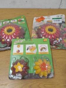 lot 28 image: (3) Hummingbird bird feeders