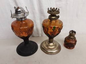 lot 14 image: 3-Amber Glass Oil Lamps