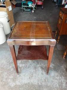 lot 22 image: Glass Top Table With Casters