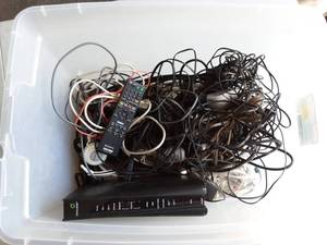 lot 63 image: Century Link Router, AV Cables, Remotes & More.