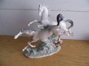lot 62 image: Lladro Horses Galloping