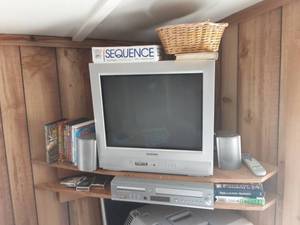 lot 16 image: Daewoo TV And Rio DVDVCR Tuner With Surround Sound Sub With 4 Speakers & DVDs.