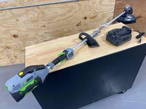 lot 29 image: EGO 15 in. 56V Lithium-Ion Cordless Electric String Trimmer with Foldable Shaft, 2.5 Ah Battery and Charger Included