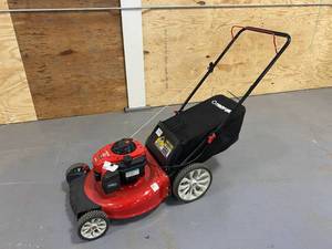 lot 33 image: TROY-Bilt 21 in. 140 cc Gas Walk Behind Push Mower with High Rear Wheels and 2-in-1 Cutting TriAction Cutting System