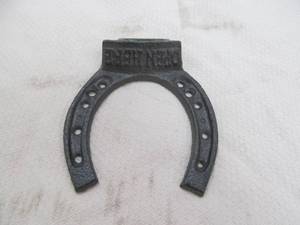 lot 9 image: Bottle Opener, cast iron