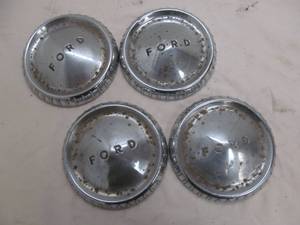 lot 67 image: Vintage Ford hub caps set