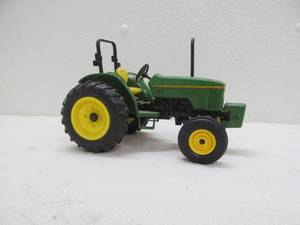 lot 142 image: john Deere collectible tractor