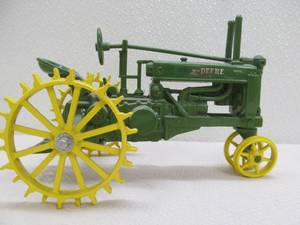 lot 144 image: john Deere collectible tractor