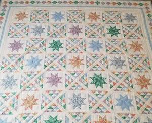 lot 51 image: Vintage Feed Sack Quilt  Star of Bethlehem