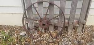 lot 103 image: Picket Fence with Iron Tractor Wheel Garden Art