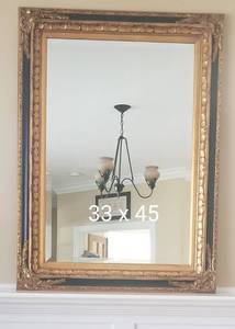 lot 55 image: Elegant Black and Gilt Carved Wooden Mirror
