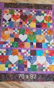 lot 50 image: Bright Hand Crafted Heart Quilt