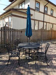lot 2 image: Cast Aluminum Open Weave Patio Table Set