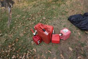 lot 71 image: Lot of Assorted Gas Cans In Various Styles and Capacities