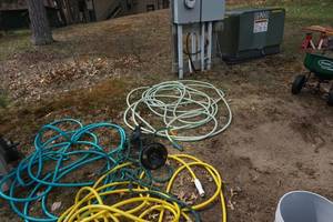 lot 77 image: Lot of Assorted Garden Hoses and Lawn Sprinklers