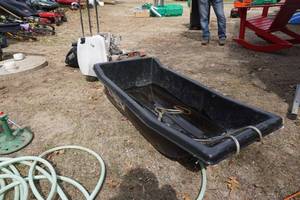 lot 41 image: Plastic Tow Behind Ice Fishing Sled