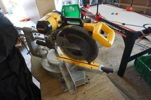 lot 22 image: DeWalt Model DW708 12 Compound Miter Saw With TableStand