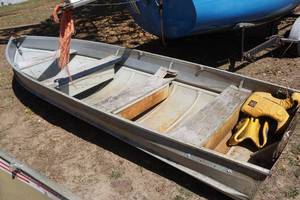 lot 11 image: 1960 Star Craft 14 Aluminum Fishing Boat