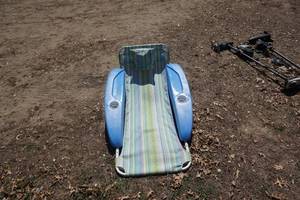 lot 100 image: Plastic Framed Floating Beach Chair