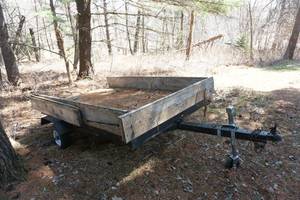 lot 15 image: 1990 8 Tilt Bed Utility Trailer