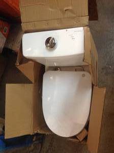 SWISS MADISON Sublime 2-piece 0.8 GPF Dual Flush Round Toilet in Glossy White Seat Included NOT USED