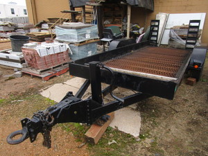 FELLING FLATBED TRAILER WITH RAMPS