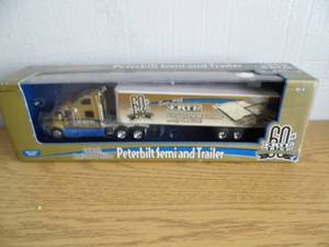 lot 12 image: Ertl Peterbilt Semi & Trailer