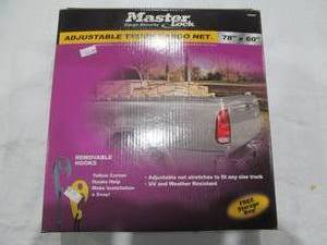 lot 12 image: Master lock adjustable truck cargo net