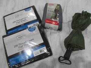 lot 89 image: umbrella, rain suit, sheets